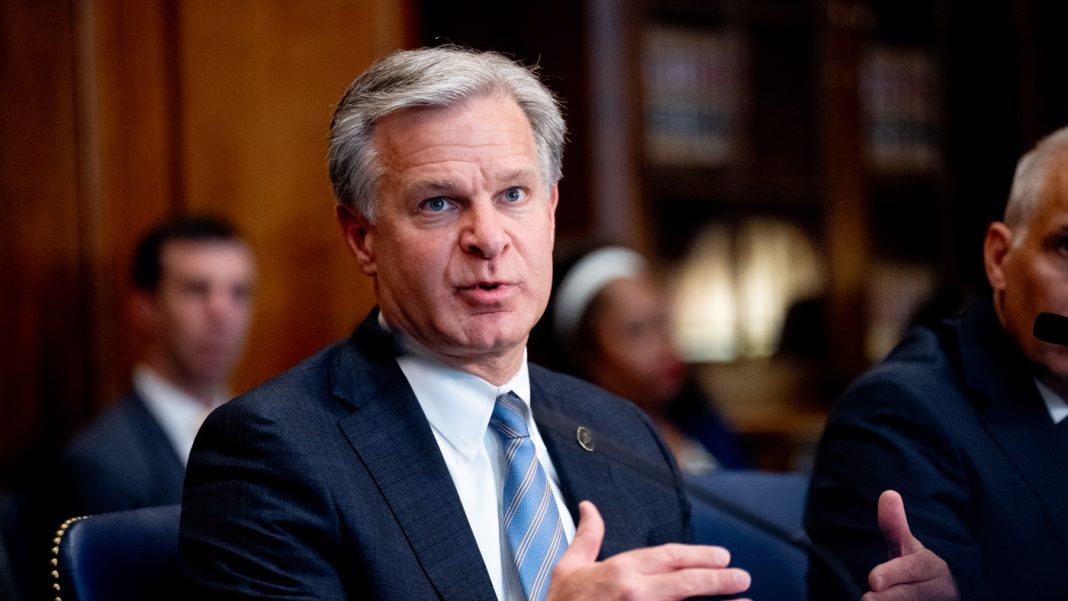 FBI Director Wray to resign at end of Biden administration : NPR