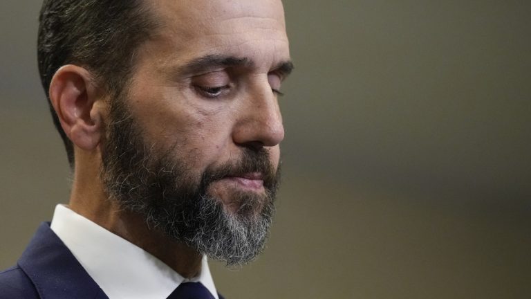 DOJ wants to withhold part of Jack Smith report on Trump : NPR