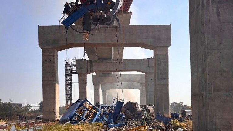 Construction crane collapses on passenger train in Thailand, killing at least 12, officials say